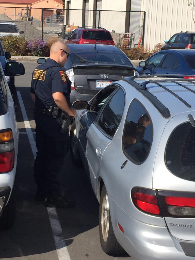 Caltrain's tweet photo. .@SMCSheriff Deputy Baron talks to someone who did not #waitforthegate #gatemeanswait #CaltrainSafe http://t.co/qAh7d3a9AY