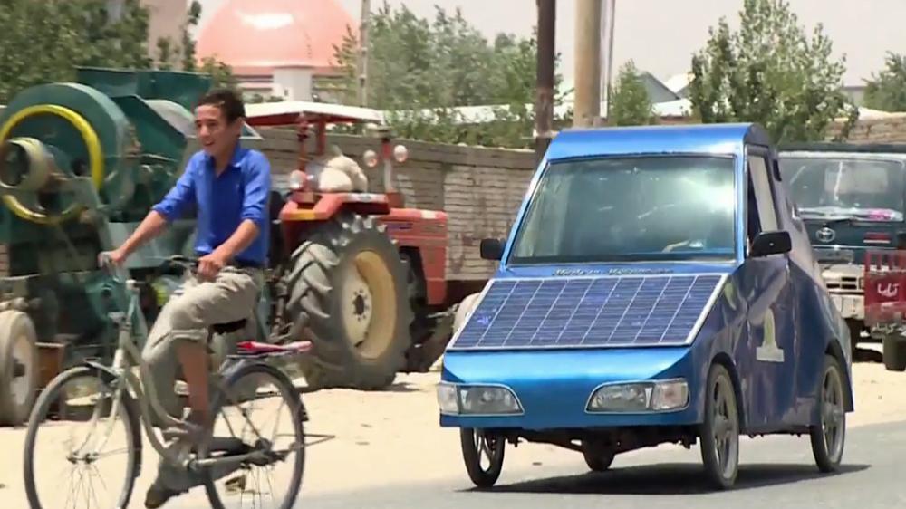 AJEnglish's tweet photo. On Al Jazeera: Afghanistan rolls out its first solar-powered car http://t.co/4rHFYgzSxn http://t.co/KBkc4udZCB