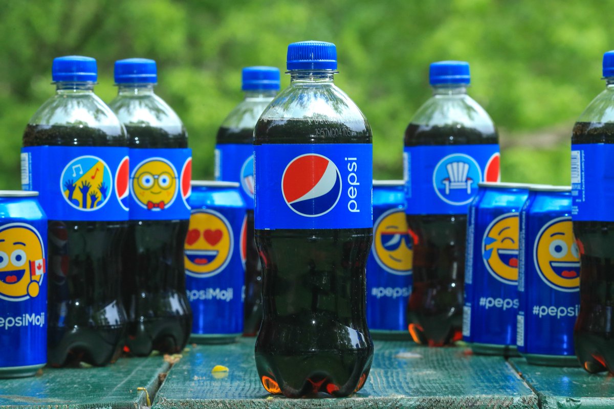 PepsiCanada's tweet photo. We are celebrating #worldemojiday in a BIG way. Join the FUN and #sayitwithpepsi all day long! #PepsiMoji http://t.co/dOrVh6WKWA