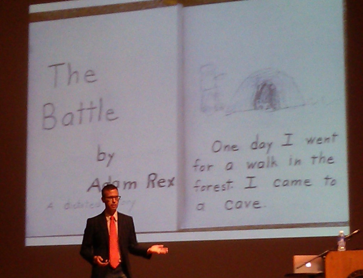 Shutta's tweet photo. Fun! Adam Rex and his first book. #MAZZAconference15 #MrAdamRex http://t.co/R2sG7kDapo