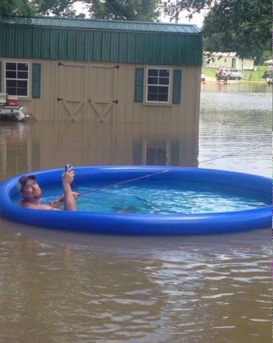readyt0hunt's tweet photo. When life gives you a flood, go fishing. http://t.co/idYsx16QDp