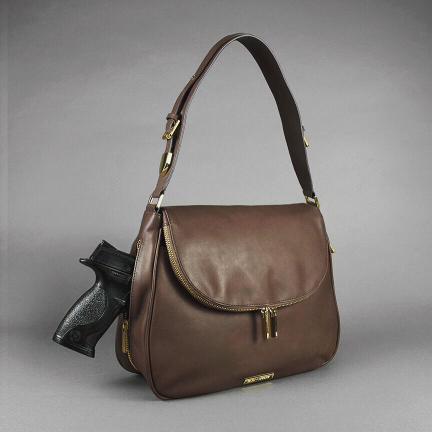 ShopBeauArrow's tweet photo. Looking for a #classic shoulder #bag with something extra? #carryconcealed with the #BeauArrow Charley #purse! http://t.co/JYDfUf38Xk