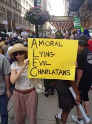 HectorSolon's tweet photo. What does "#ALEC" stand for?
A_ Amoral
L_ Lying
E_ Evil
C_ Charlatans
#ALECinChicago sign via @OccupySD for #ALECinSD http://t.co/xtSpUYeENi