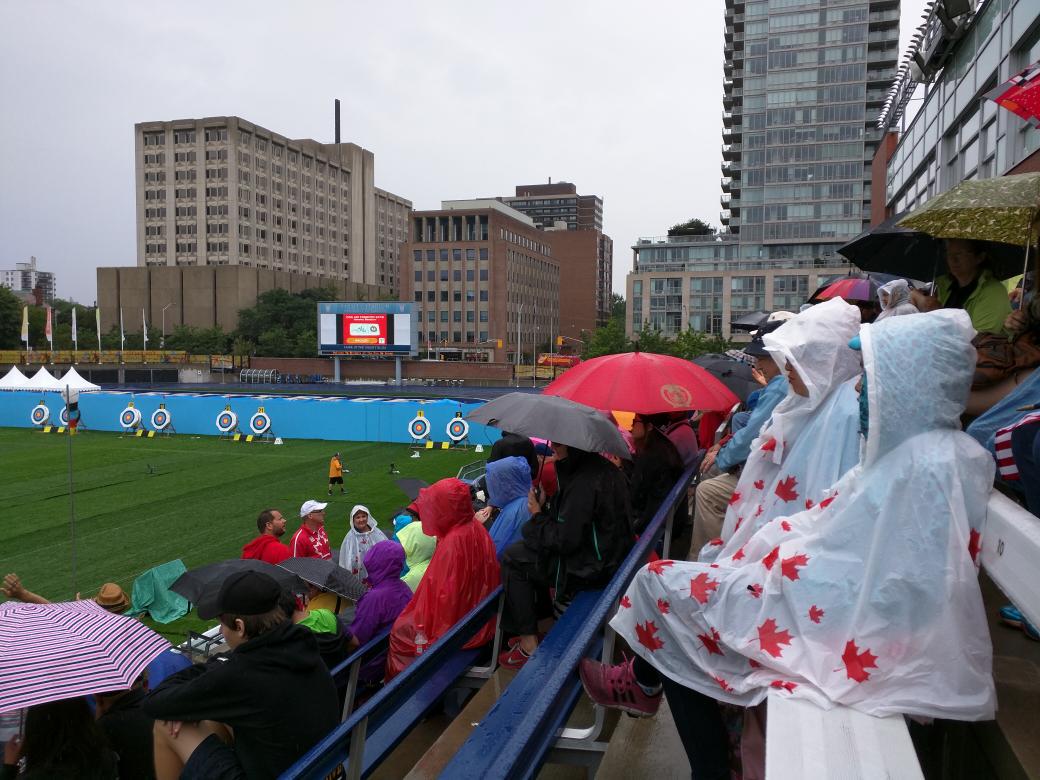mamafaves's tweet photo. @TO2015 #panam #archery spectators are enjoying the games despite the weather. http://t.co/yVkT80fE6Q