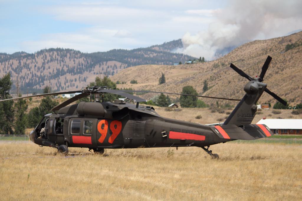 WANationalGuard's tweet photo. One year ago this week the @wa_natl_guard was there to support @waDNR during the #carltoncomplex #WaWILDFIRE http://t.co/GKyoeJWoSZ