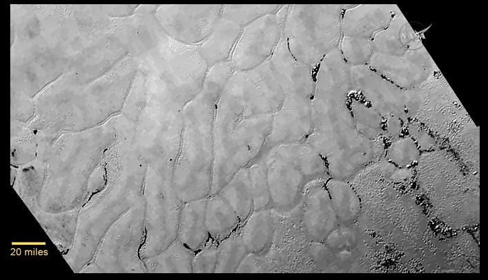 BuzzFeedNews's tweet photo. .@NASA releases image of Pluto's surface and "icy plains" #PlutoFlyby http://t.co/1moS58jksS