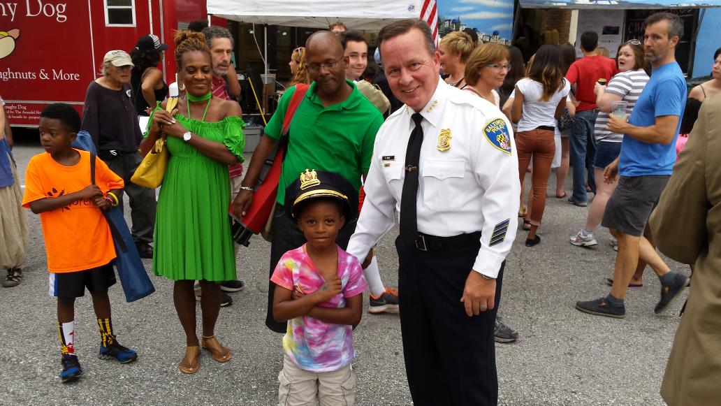BaltimorePolice's tweet photo. We just met a future police officer at Artscape. He asked to wear #CommDavis hat. http://t.co/IWUciYQcZc