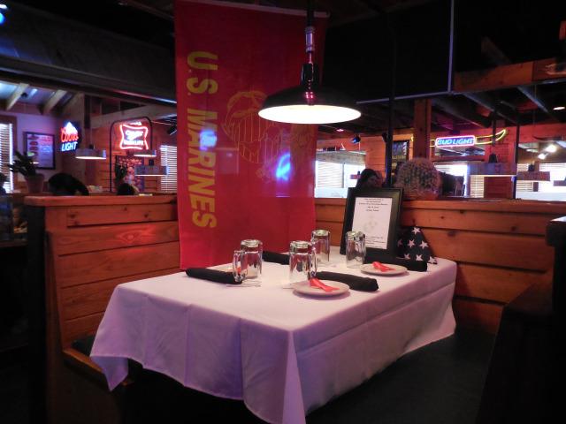 Jennifer__Brett's tweet photo. At the @texasroadhouse in #Chattanooga, a table set in honor of the slain service members http://t.co/S3268pPnoJ http://t.co/xSf8tvOaEu