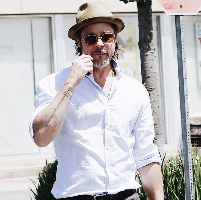 kailawinslet's tweet image. BUT can we pls talk about Brad Pitt&apos;s new tattoo? #hubbygoals