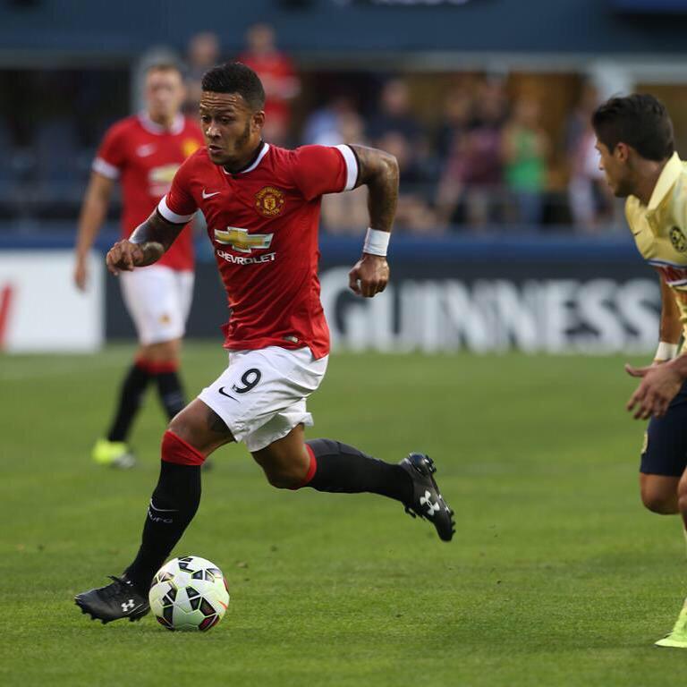 Memphis's tweet photo. Proud to make my debut for ManchesterUnited http://t.co/6ZgYeYgQAM