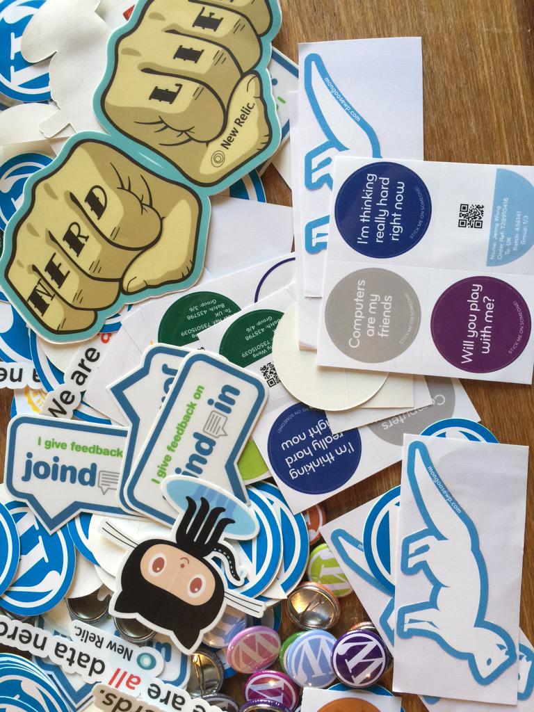 eddiejaoude's tweet image. Stickers from @miss_jwo thank you! #phpsc. I didn&apos;t take them all :-)