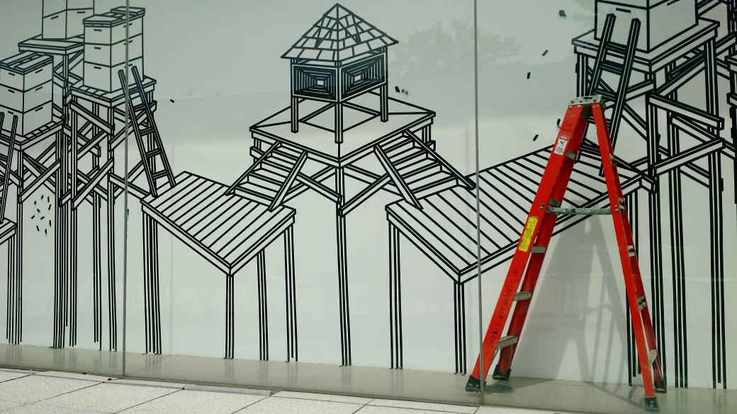 ToledoMuseum's tweet photo. It's day two of Cam Fuller's masking tape installation at the Glass Pavilion. #playtimeTMA http://t.co/EV3Iv1sBQB