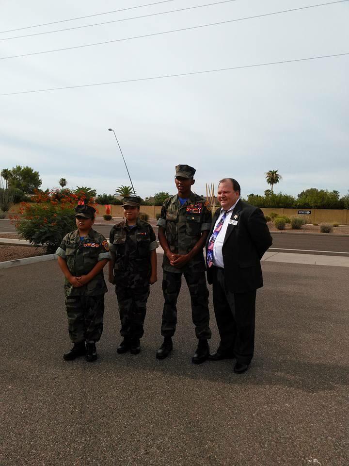 EVYM started day cleaning a disabled veterans yard then did a Flag ceremony at Mission Palms of Mesa