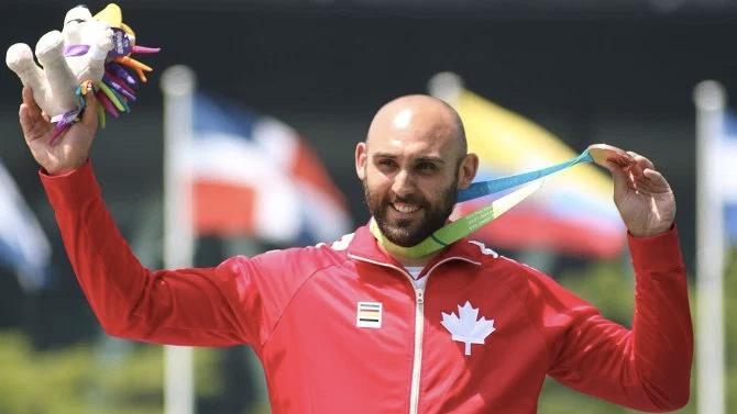 TeamCanada's tweet photo. .@Gzuz wins bronze for #TeamCanada as #TO2015 archery competition comes to an end: http://t.co/0MDNIAK4qs http://t.co/81yEaB0RKp