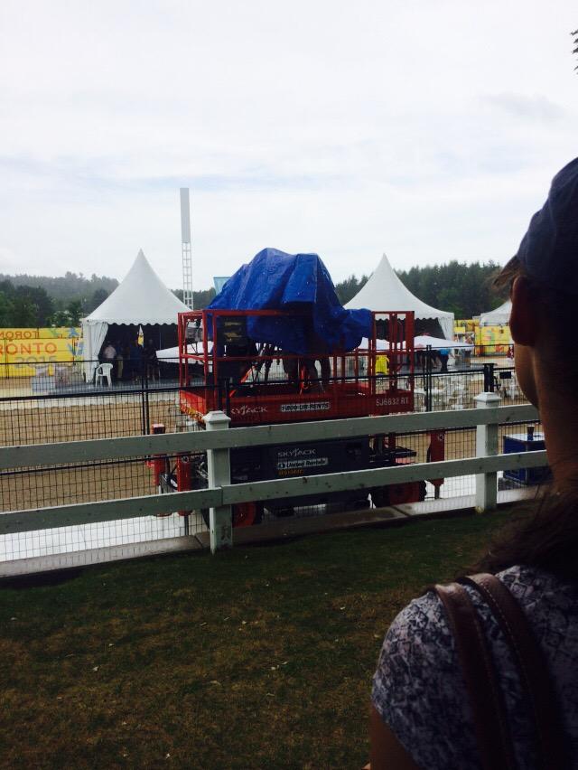 Huddled under stands as it down pours! Waiting for medal ceremony #PANAM2015 #Eventinglive #showjumping