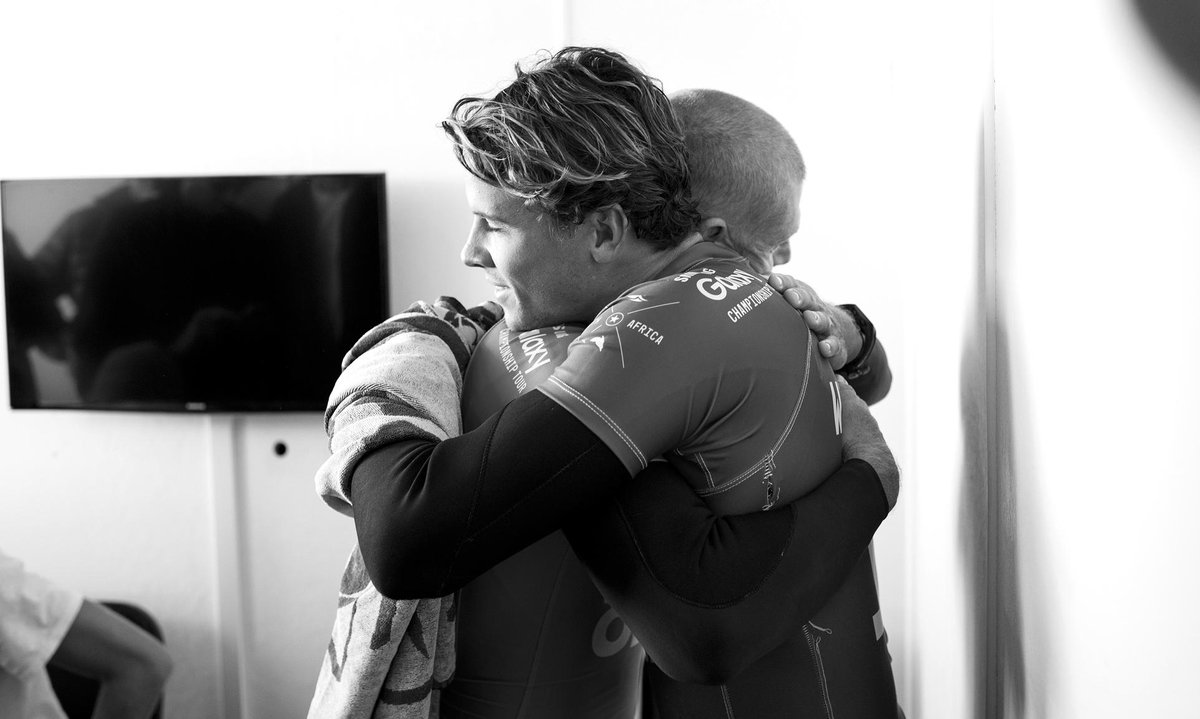 wsl's tweet photo. Friends first. @Mick_Fanning &amp; @julian_wilson share a moment of relief safely on the beach #JBayOpen 📷@kirstinscholtz http://t.co/pNU6NX1M6t