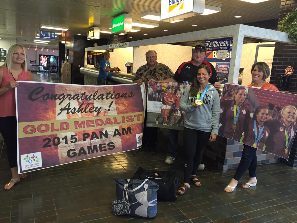 LethbridgeSport's tweet photo. Welcome home @AshleySteacy @RugbyCanada @TO2015 #Gold http://t.co/gFp4AkYUo3