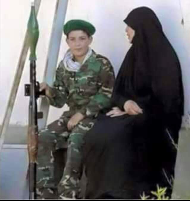 amferas55583's tweet photo. اصغر شهيد في الحشد الشعبي 
14سنة والدة شهيد وامة هذهي لامرة العراقية الغيورة دفعت بة ان يدافع عن ارض العراق http://t.co/vrNWPmXYQj