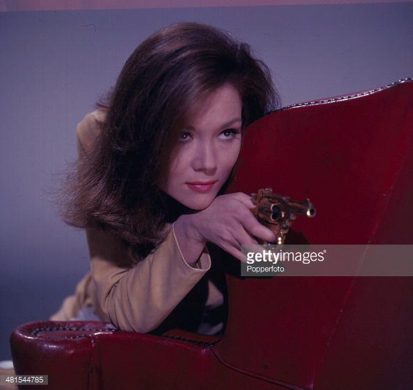 Putting my work computer in \"research\" mode while I Google \"Diana Rigg with gun\". Happy Birthday, Mrs Peel :) 