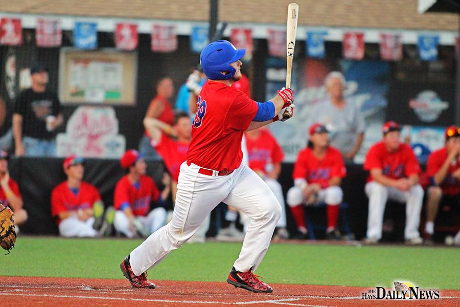 Derek Dickerson watches as home run leaves Larks Park during the fifth inning.