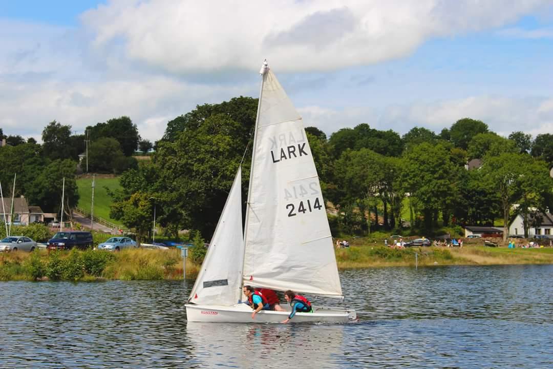 Paddling to fill the sails during light winds on Inniscarra Lake last Sunday