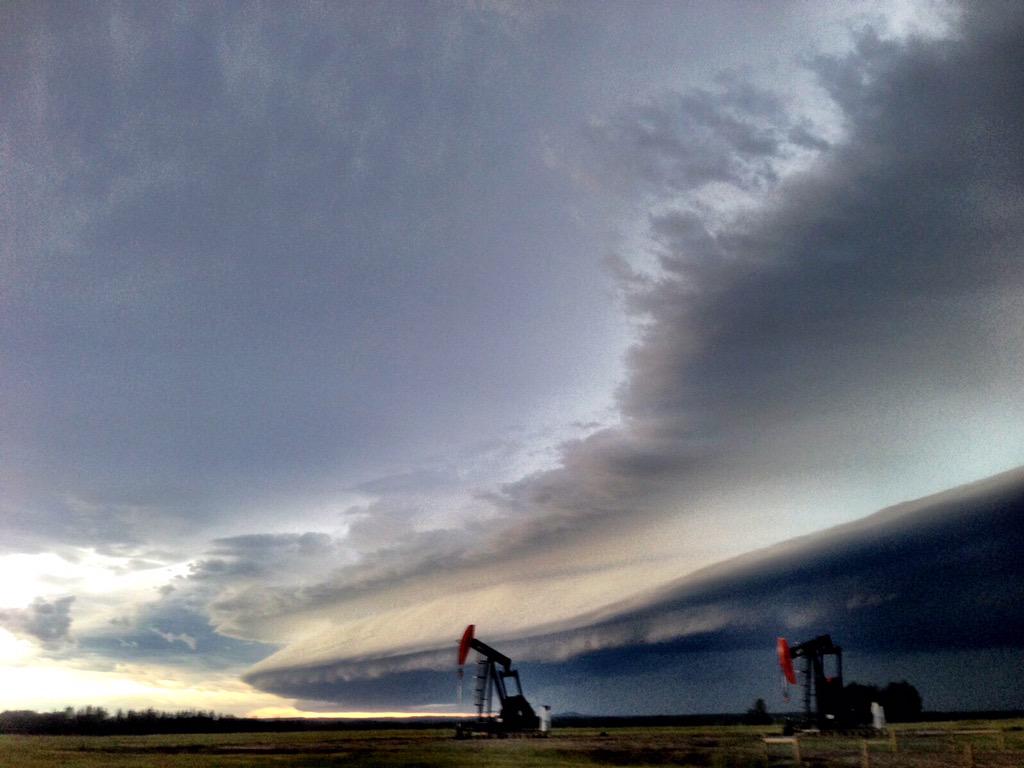 How Albertan is this photo? Shelf cloud and pump jacks. Snapped by our own @MesocyclonicWX