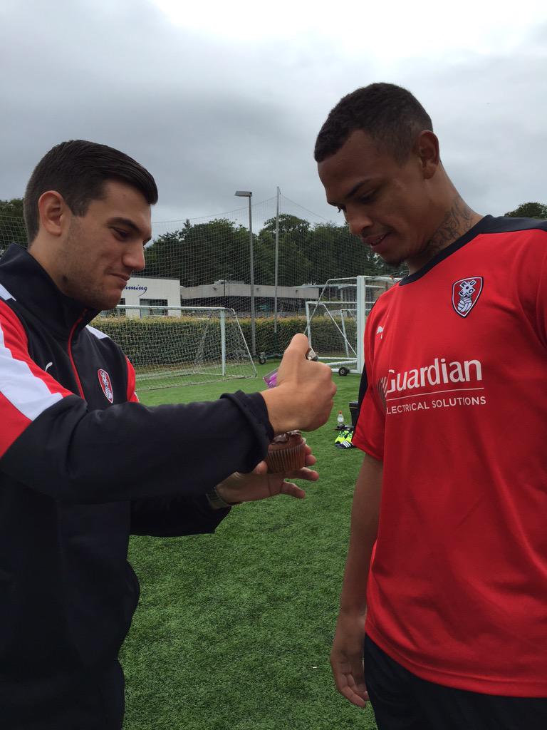 RotherhamUnited's tweet photo. Happy 21st Birthday to @ClarkeHarris. Here he is presented with a cake at training by analyst @adam_housley1 #rufc http://t.co/xbaoi6LFeN