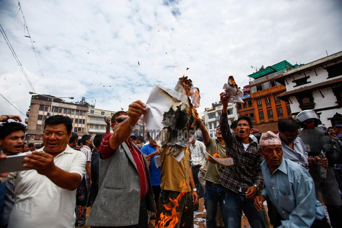 kathmandupost's tweet photo. A scene at Basantapur Durbar Square during public opinion collection on Tuesday. Cadres of RPP-N clashed with police. http://t.co/s69iaZUKYm
