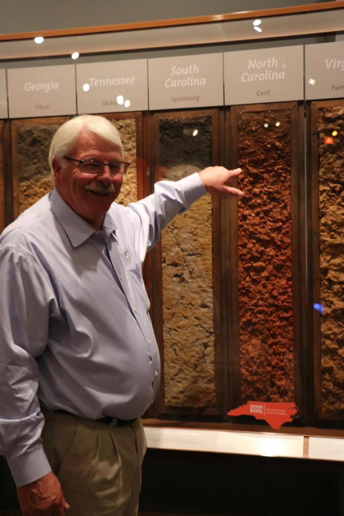 NCAgriculture's tweet photo. Ag Commissioner Steve Troxler recognizes our official state soil at the #DigitNC exhibit at @naturalsciences. #cecil http://t.co/8cqi0uuU0S
