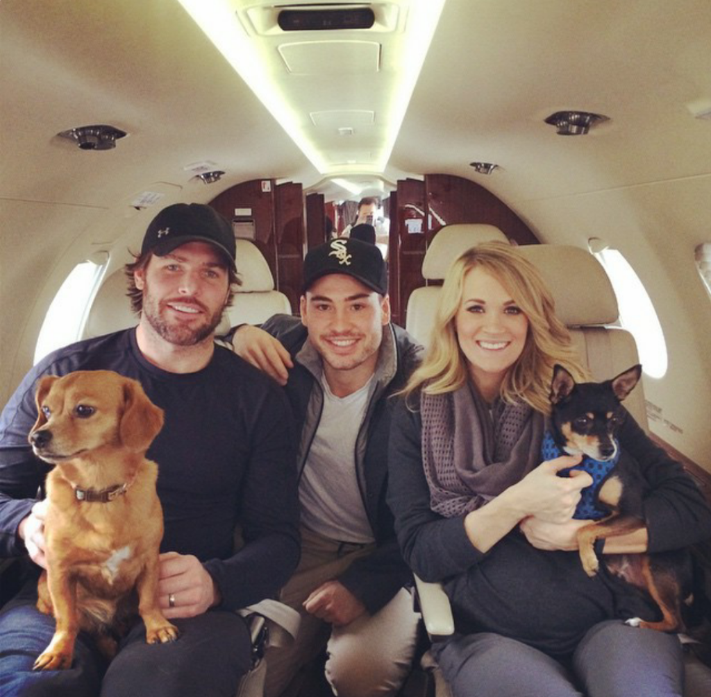 NHL's tweet photo. .@carrieunderwood &amp; @mikefisher1212. And pups. 

Enough said. (📷: @taybeckone9) #DogDays http://t.co/VSGiwiiRLH
