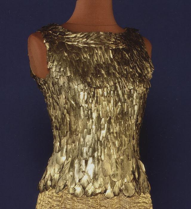 Happy birthday to fashion designer Oscar de la Renta. A feathered dress in our collections:  