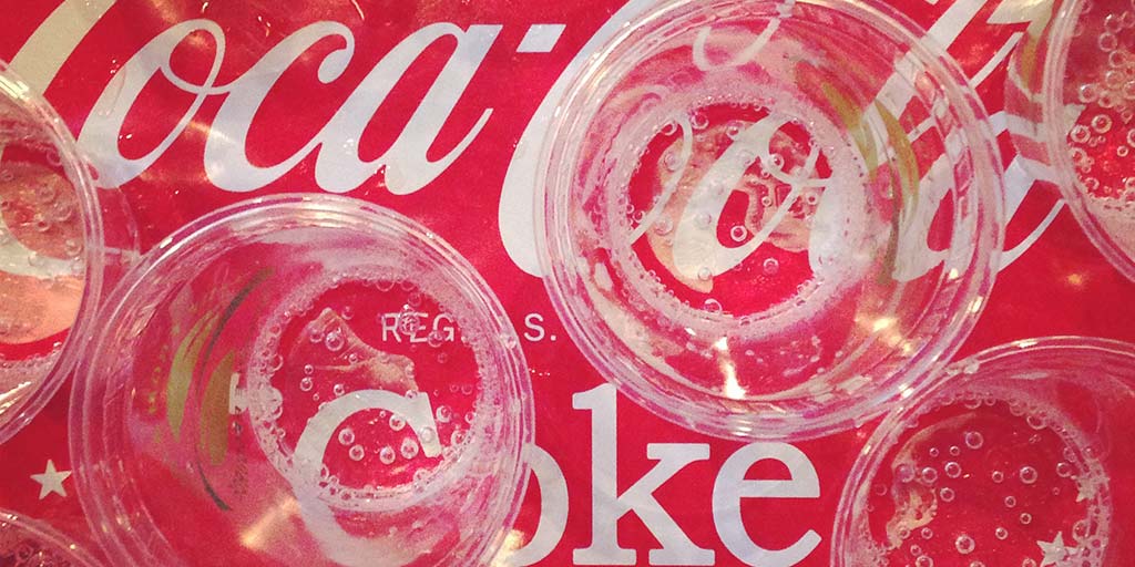 100+ flavors, only one mouth. #HappyPlaceProblems #WorldofCocaCola