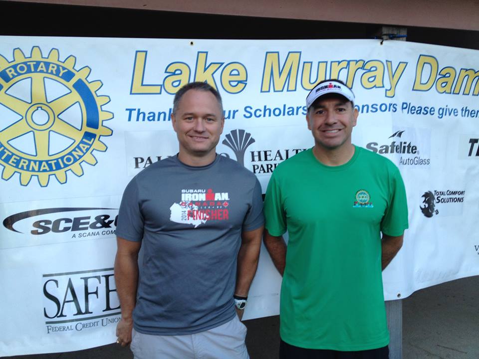 DamRun10K's tweet photo. @ernienation Ernie Yarborough and Anthony Hernandez working hard, getting everybody registered at the 2014 @DamRun10K http://t.co/hRwCIjZfWt