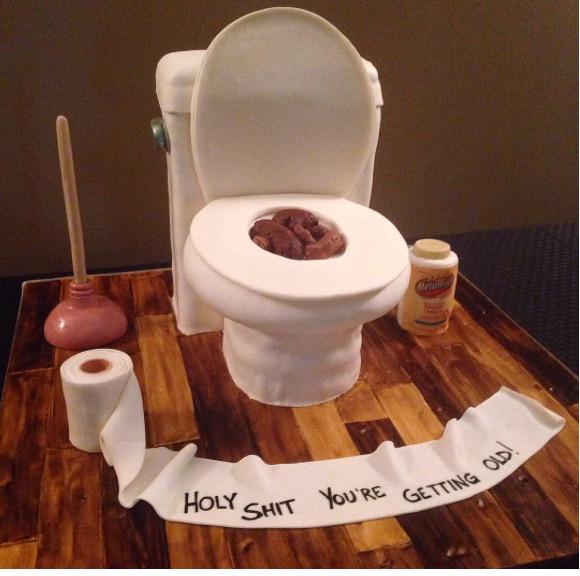 Luke Bryan\s birthday cake from his wife Caroline. We think it\s chocolate? Mmmmmm Happy 39th Luke!!! 