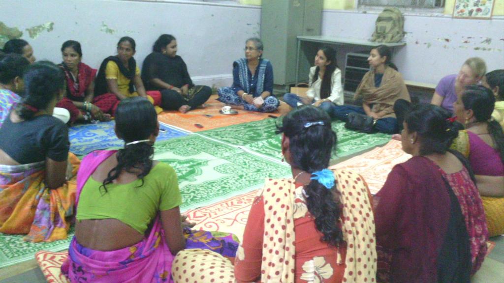 PreranaATC's tweet photo. Cindy Dyer from @VitalVoices discussing  with women from Falkland Road #redlight area about use of cell phones. http://t.co/Jo6qgop5d4