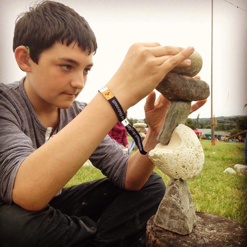 festunderstars's tweet photo. Stone balancing at #UTSf2015 Sam has the knack! #concentration @ukrfchaps http://t.co/1fLIvZ1IDP
