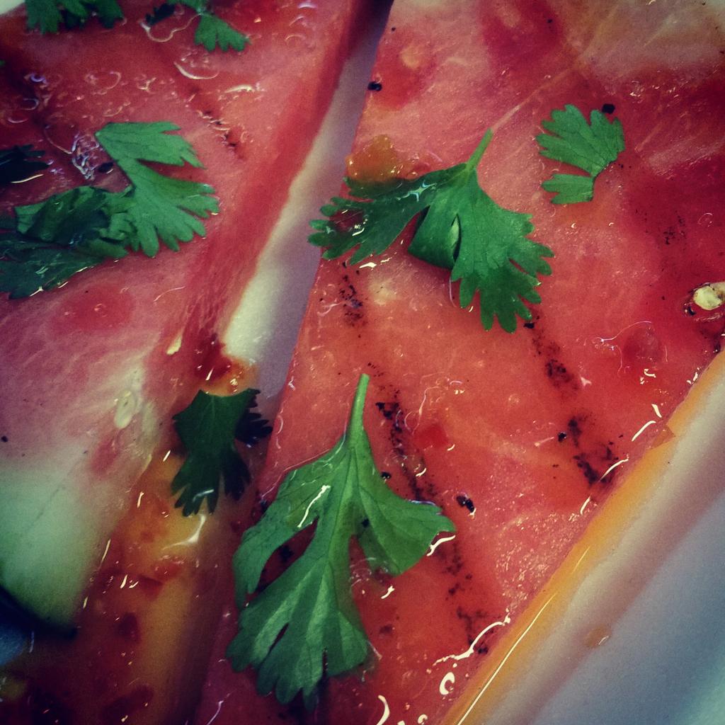 Grilled watermelon w/ garlic, chili, lime dressing and fresh cilantro on the menu today.