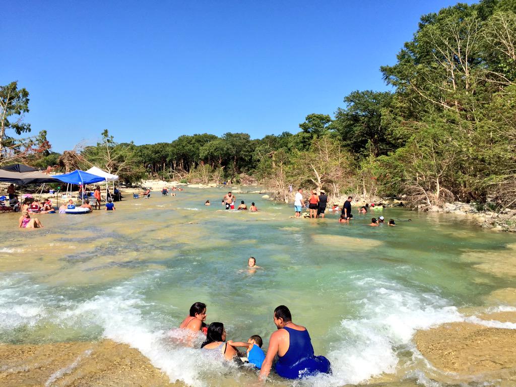 Blanco River Wimberley months deadly floods people returning swim