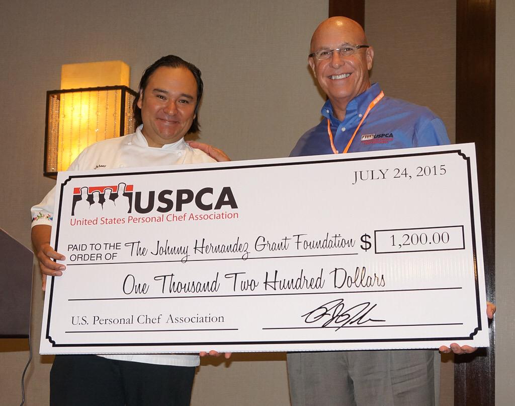 USPCA's tweet photo. #USPCA2015 Pres @larrylynch presents Chef Johnny Hernandez @iamchefjohnny a check for his foundation with thanks! http://t.co/LDyL5vg0IR