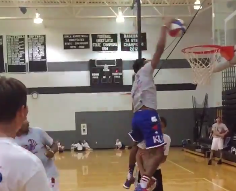BleacherReport's tweet photo. VIDEO: Kansas guard Devonte’ Graham destroys unsuspecting camper with dunk http://t.co/dwaHQHBabt http://t.co/DdBluQXvmB