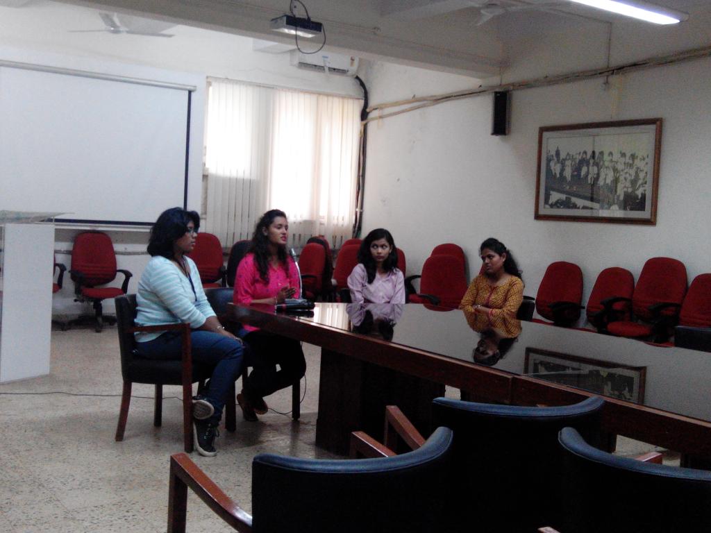 All the participants listening to a speaker as she tries to make her point in the debate #DigitalIndia