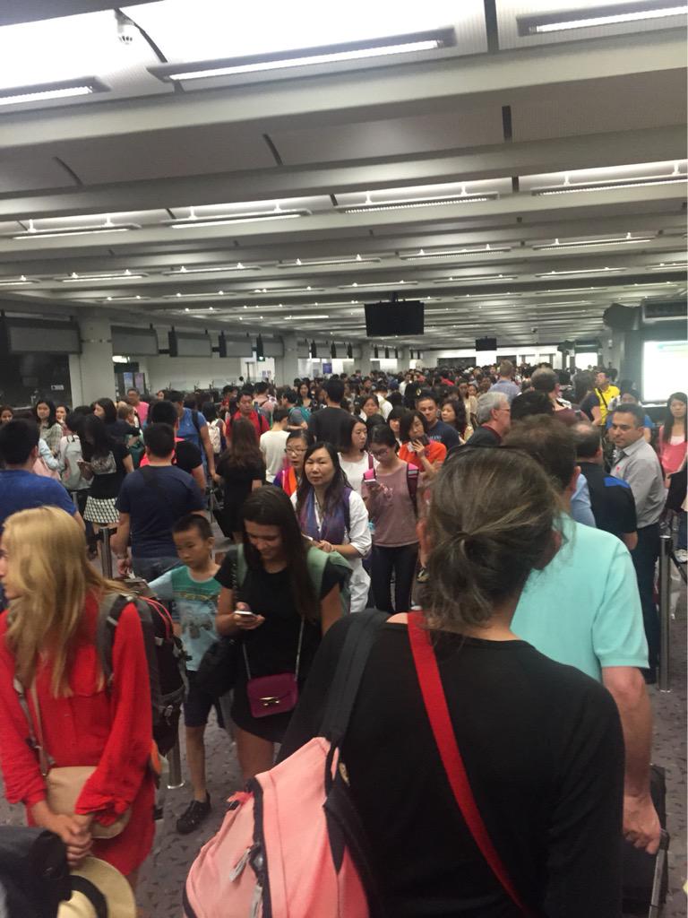 cmacmeik's tweet photo. QF128 cancelled, 3hrs to find what was happening, now at least 2hrs in this queue as a Platinum FF 😢 #qantas #HK http://t.co/gn73Mxnwma