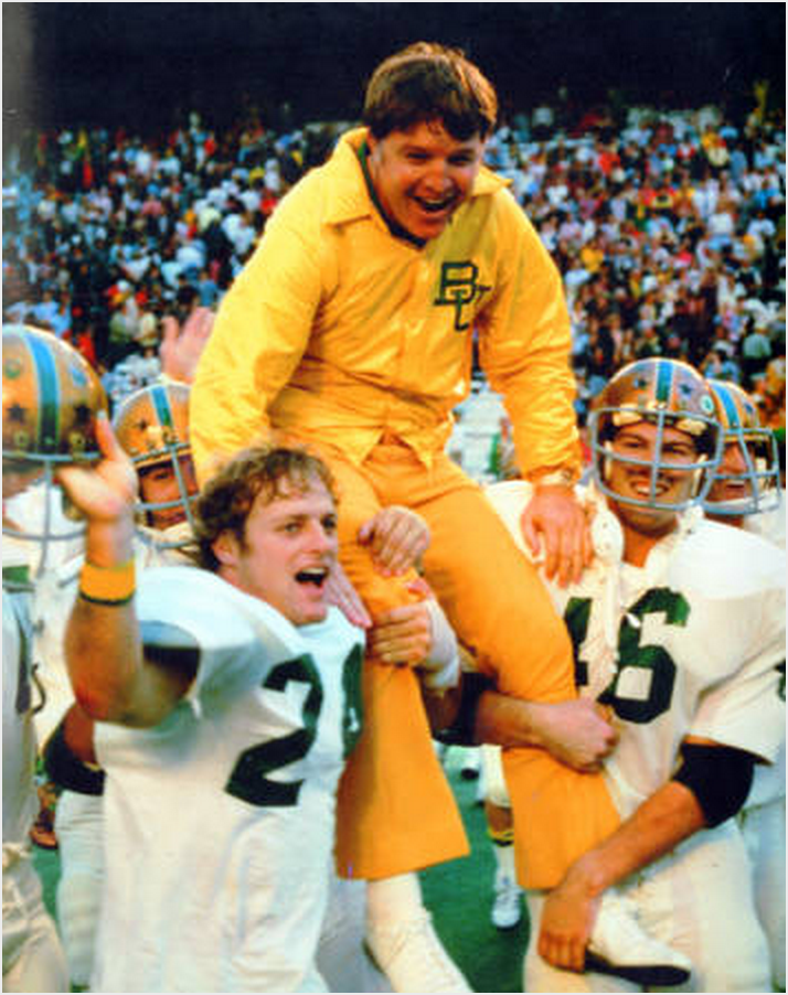 Texas_Pictures's tweet photo. #Baylor University Head Coach, Grant Teaff, is lifted by his players after a 31-14 Baylor victory over #SMU, 1974. http://t.co/koEmLZqYUl