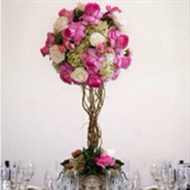 Flower trend from Wedding Ideas-romantic luxe.  Here is our beautiful topiary of lovely roses.   #weddingflowertrends