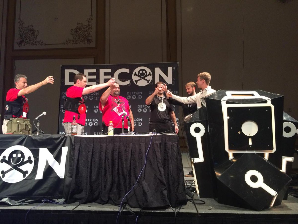 MeghanKel's tweet photo. A traditional #DefCon shot for first time speakers (they considered JB Straubel a first timer). @dropalltables #tesla http://t.co/p5jC2zCaY7