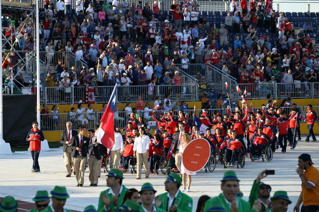 MindepChile's tweet photo. La delegación chilena brilla en la ceremonia de inauguración de los Juegos Para Pan @TO2015 #ChilePanam http://t.co/6fO6lAfM07