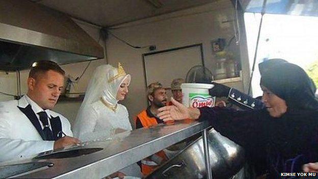 bbcworldservice's tweet photo. "There was huge applause." The bride who shared her wedding meal with Syrian refugees 📻 http://t.co/N7rlNQKDSD http://t.co/zz15zSSgIS