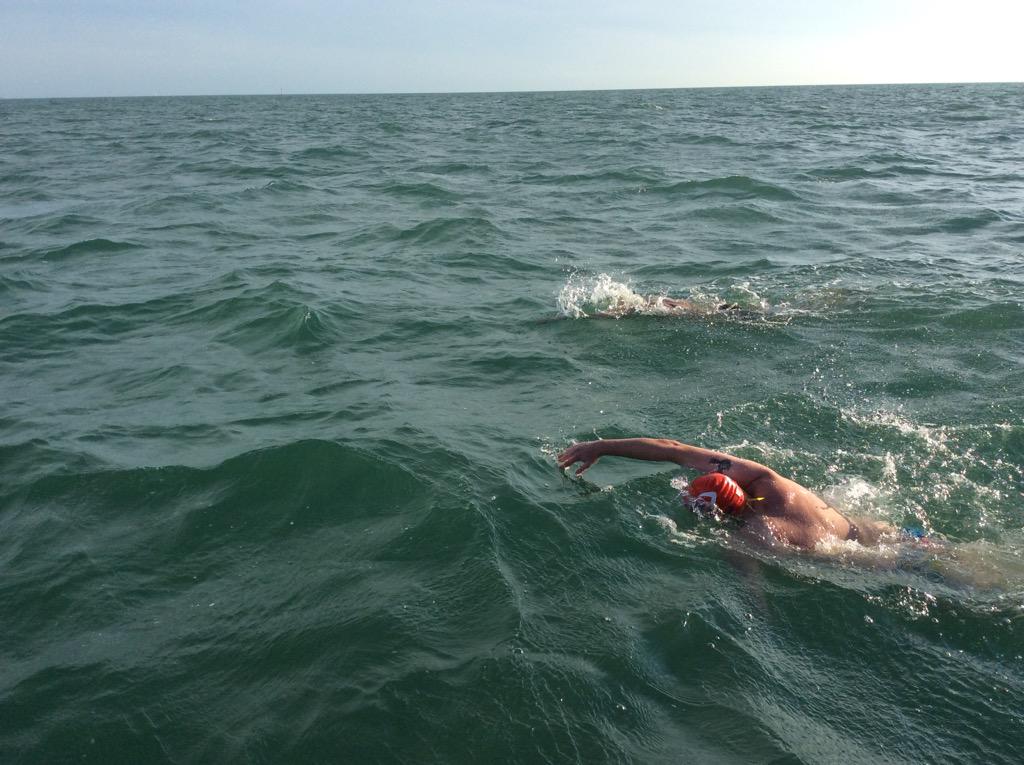 swim4starlight's tweet photo. It's tough out there. Coach Matty has jumped in as a pacer to help bring him in. http://t.co/7cffEWh1QK