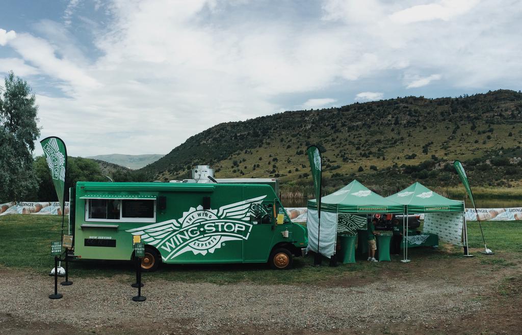 wingstop's tweet photo. What’s good, Red Rocks? #WingstopTour is here chilling with free wings &amp; swag. Visit us from 12-2pm for the hookup http://t.co/PO93GynIeu