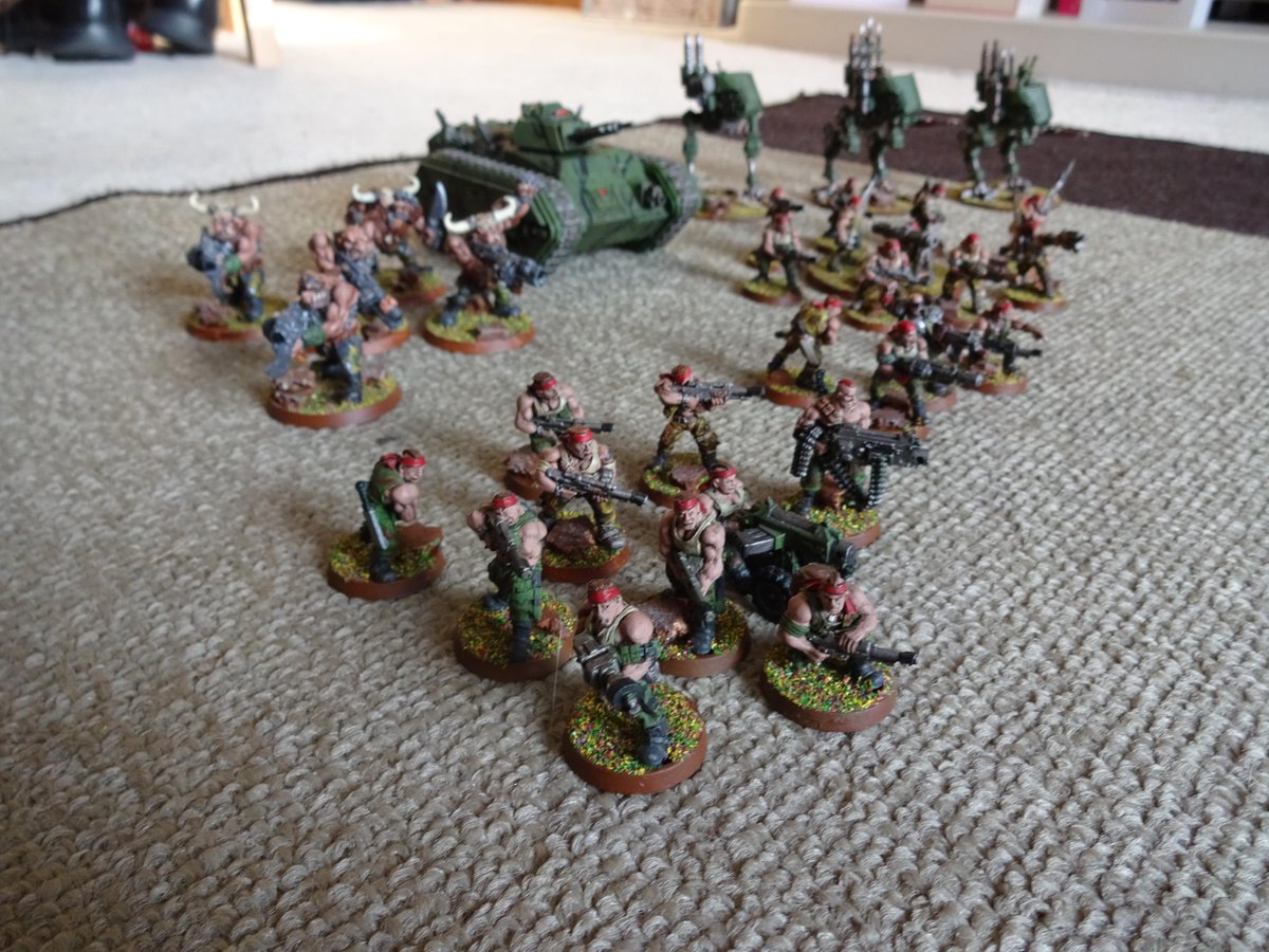 TomfeatTom's tweet photo. The might of the Astra Militarum (with a little help from papa Nurgle) deploying in my living room #warhammer http://t.co/v26qkowZgt